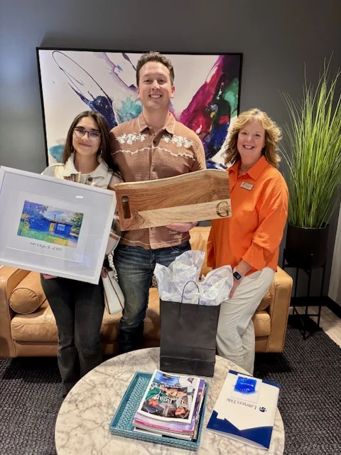 Home buyers celebrating their closing with Hilary Wesley