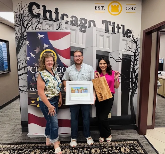 New homeowners celebrating closing day with Hilary Wesley